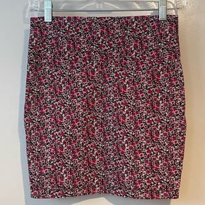 Charlotte Russe Stretch Mini Skirt. Black with Pink Floral Pattern. Size Small.
